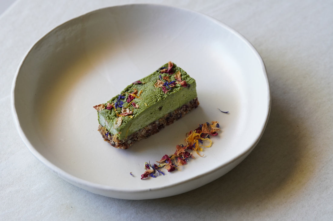 raw vegan matcha cheesecake slice